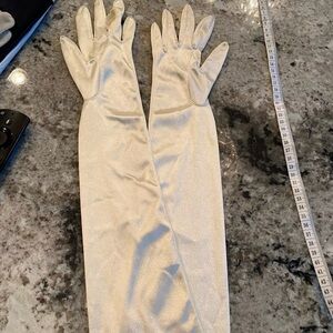 White/ivory satin wedding gloves with snap closure in ring finger